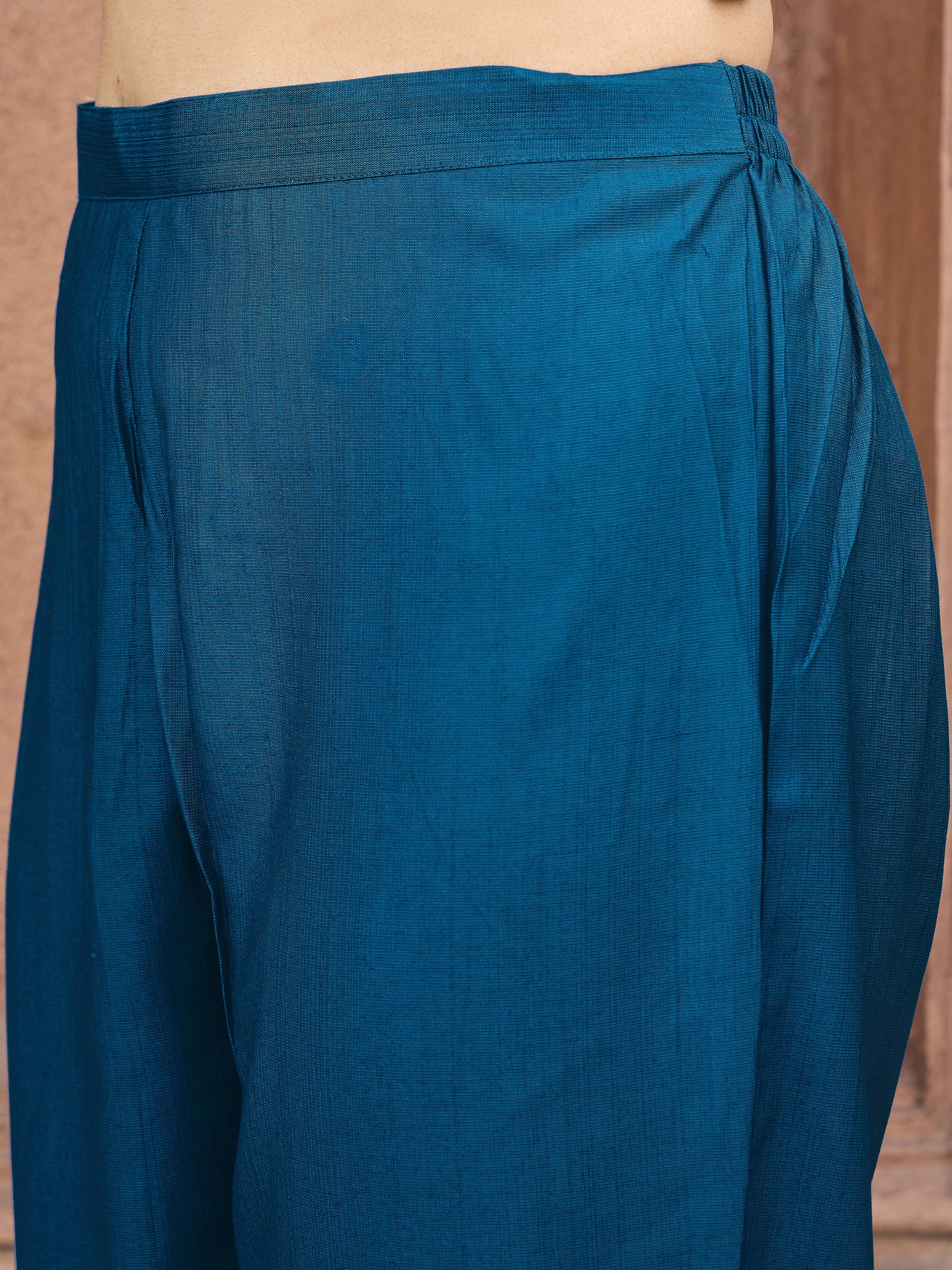 Teal color silk blend with off white thread embroidered kurta & trouser with dupatta set